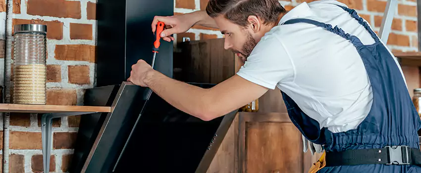 Old Rusted Metal Fireplace Repair And Replacement in University Heights, SK